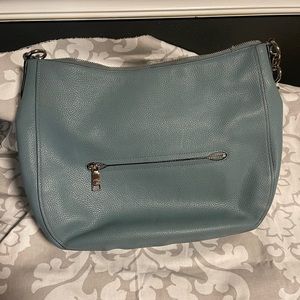Light Blue large COACH bag.